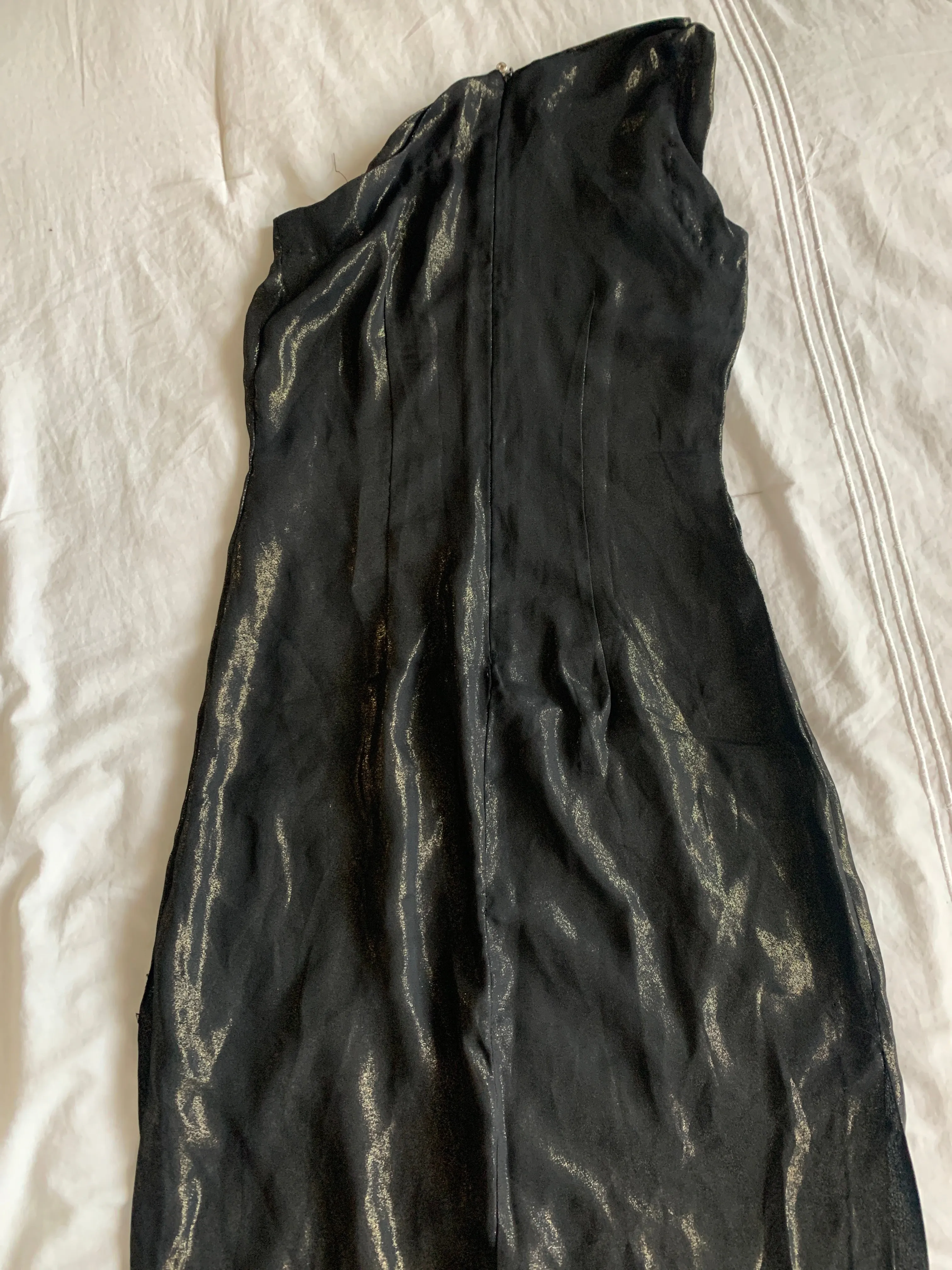 One shoulder layering piece